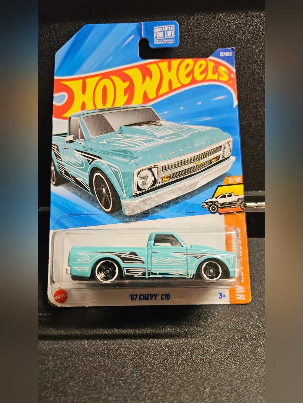 HW Light Blue 1967 chevy C10 Hot Trucks package slightly damaged in sto